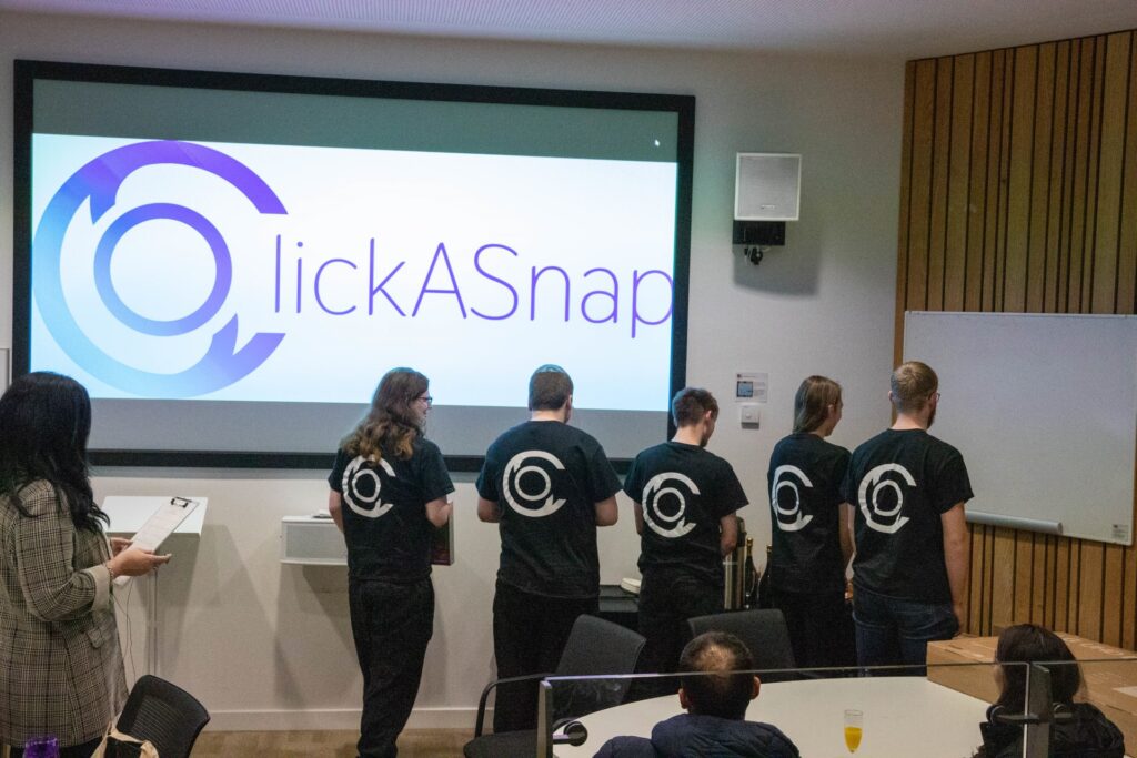 Me and my group all wearing matching ClickASnap shirts